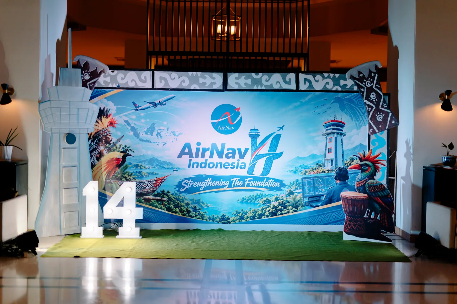 Backdrop Dirgahayu ke-14 AirNav Indonesia Cabang Sentani bertema Strengthening The Foundation